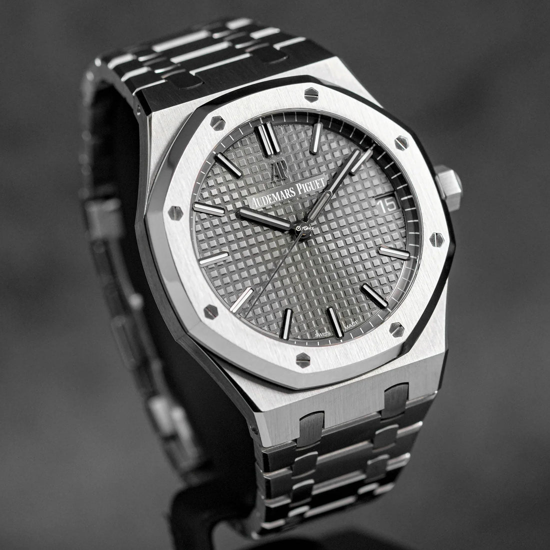 Audemars Piguet Royal Oak watch, specifically a 41mm model with a grey dial.